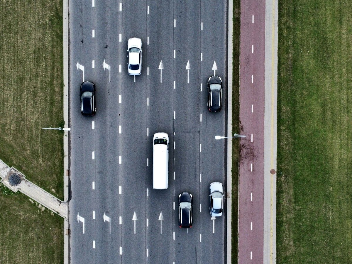 Cars travelling in marked lanes, seen from above